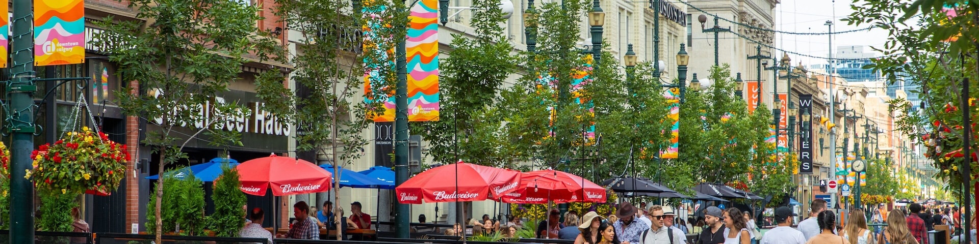 Stephen Avenue featuring street scenes and a city as well as a small group of people