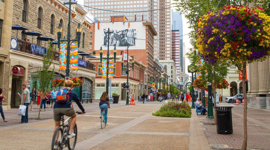 Stephen Avenue showing street scenes, road cycling and a city