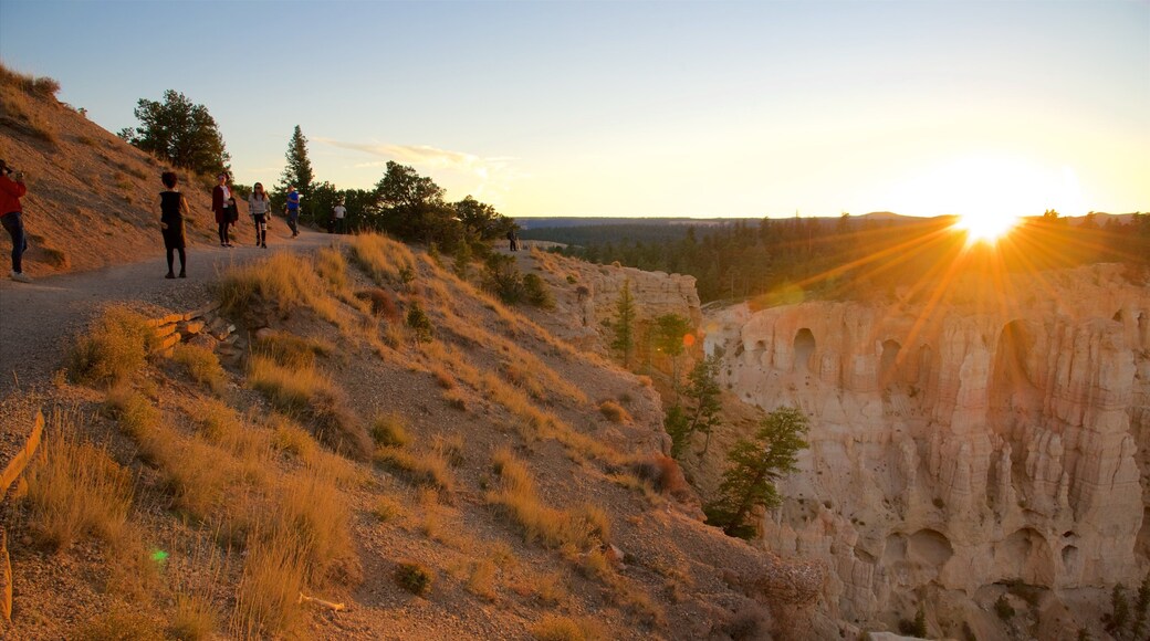 Bryce Point showing tranquil scenes, a gorge or canyon and a sunset