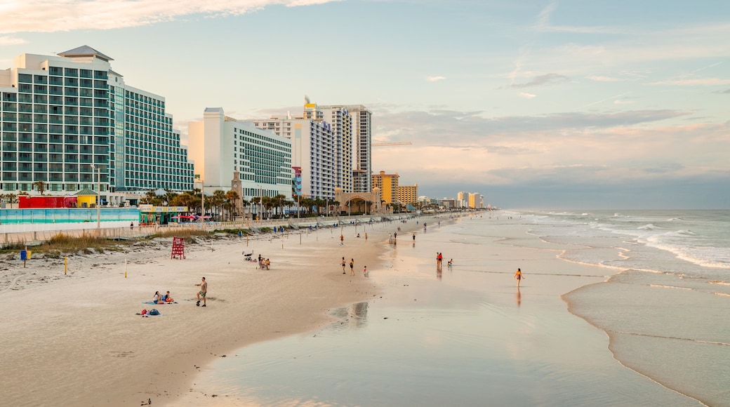 Beach at Daytona Beach which includes a sunset, a beach and general coastal views