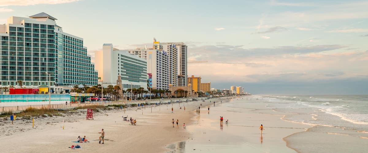 Beach at Daytona Beach which includes a sunset, a beach and general coastal views