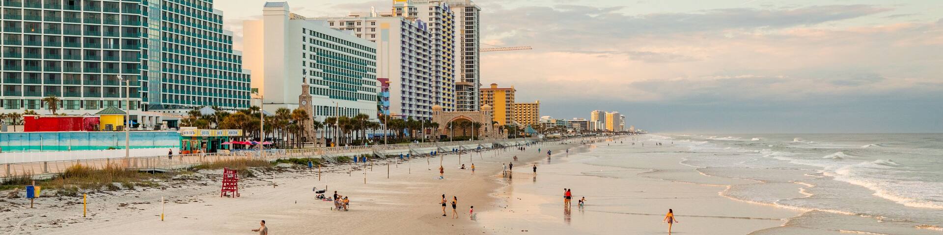 Beach at Daytona Beach which includes a sunset, a beach and general coastal views