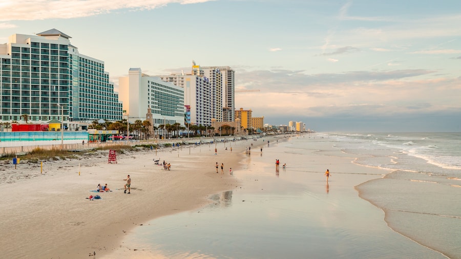 Beach at Daytona Beach which includes a sunset, a beach and general coastal views