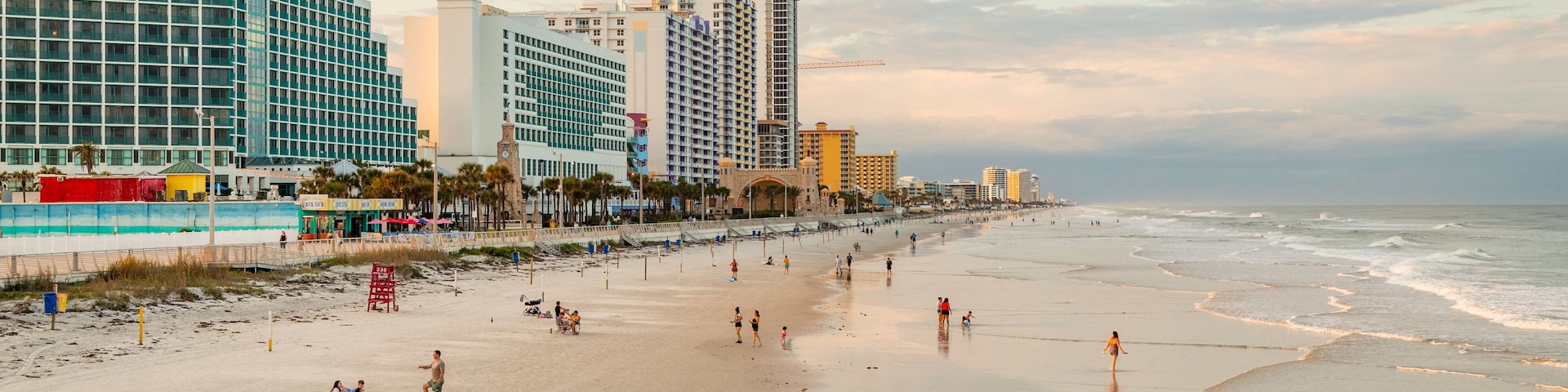 Beach at Daytona Beach which includes a sunset, a beach and general coastal views