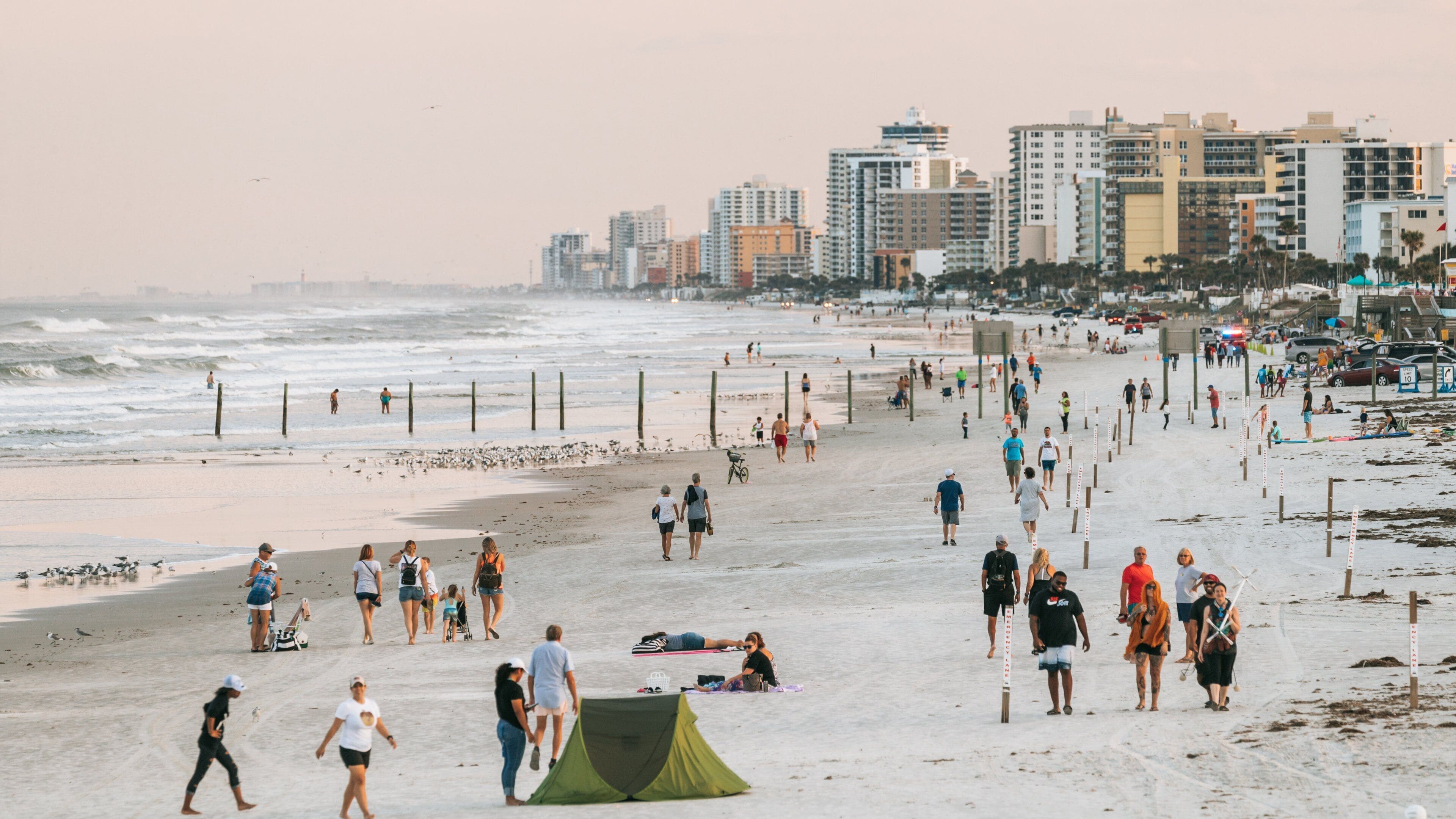 Beach at Daytona Beach which includes a beach, a coastal town and general coastal views