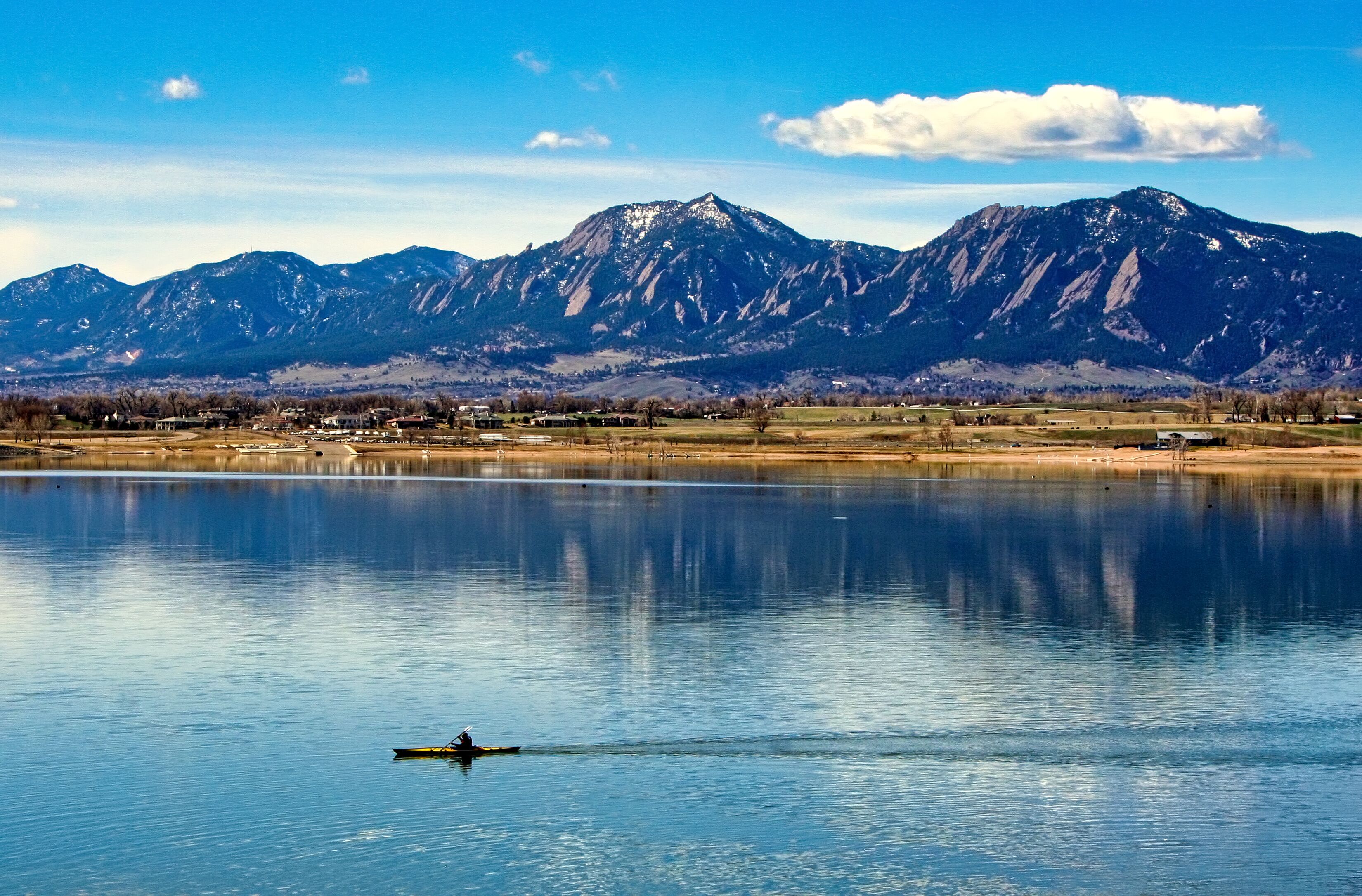 Kayaking on Boulder, Colorado's reservoir provides great views of the Flatiron mountains