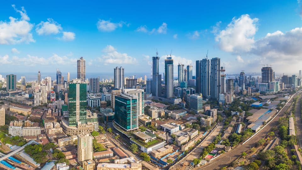 Aerial panoramic view Mumbai's Lower Parel skyline, with Worli, Prabhadevi, Elphinstone, Dadar and Bandra also visible.