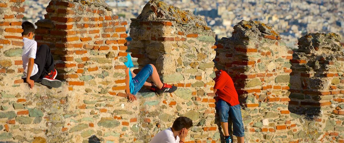 Byzantine Walls featuring a ruin and heritage elements as well as a small group of people