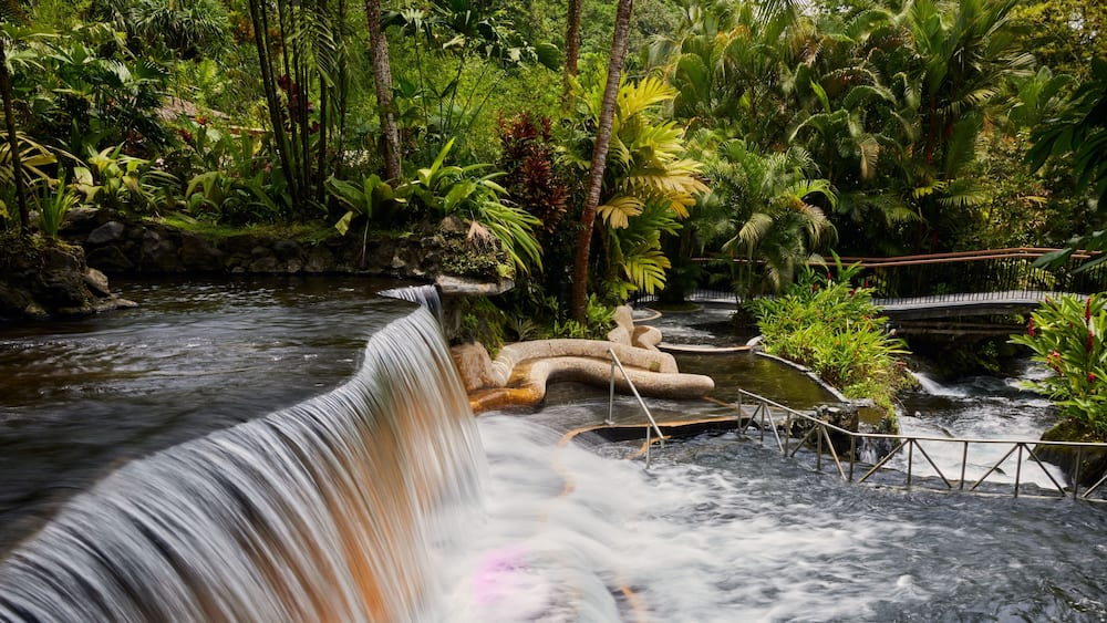 Tabacon geothermal waterfall in La Fortuna Arenal volcano area, Costa Rica