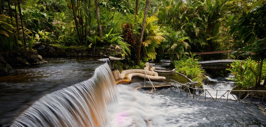Tabacon geothermal waterfall in La Fortuna Arenal volcano area, Costa Rica