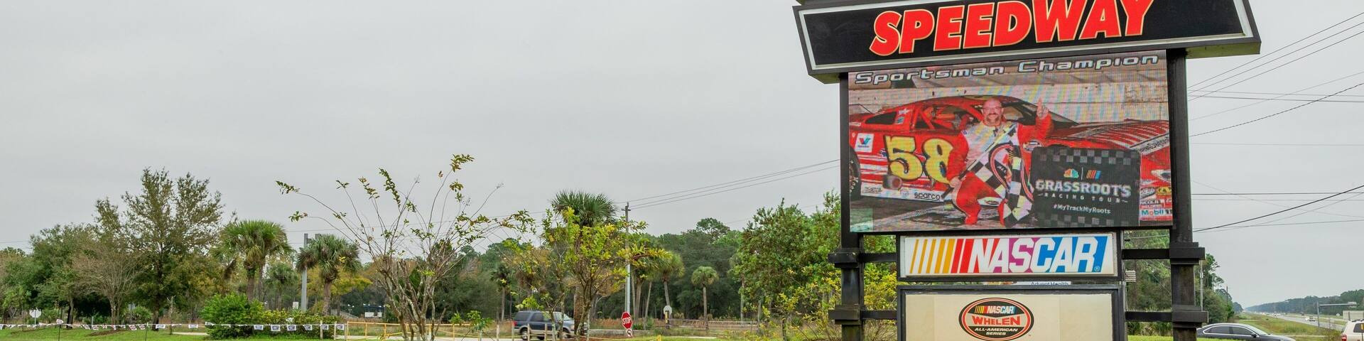 New Smyrna Speedway which includes signage