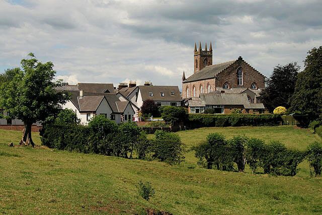 The south end of Lochmaben Lochmaben Church, built between 1818 and 1821, is on the right.