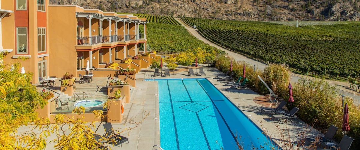 Burrowing Owl Estate Winery showing a pool, a hotel and farmland