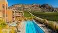 Burrowing Owl Estate Winery showing a pool, a hotel and farmland