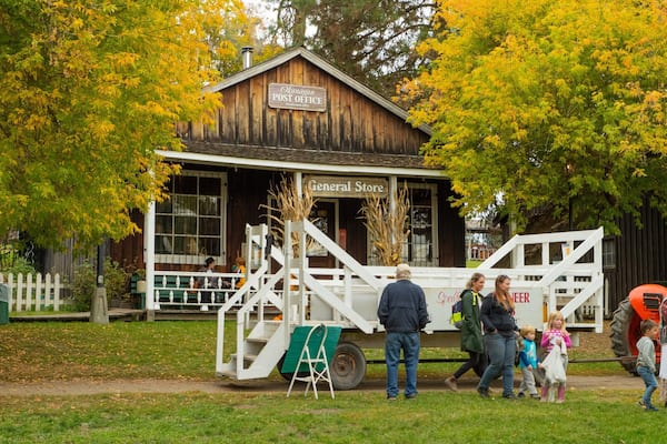 Historic O\'Keefe Ranch featuring a small town or village as well as a family