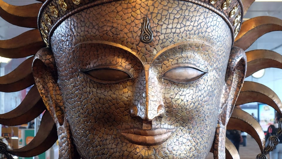 Surya, the resplendent one by Satish Gupta, the big golden statue in international Airport of Delhi. Indira Gandhi International Airport is the 32th busiest in the world.