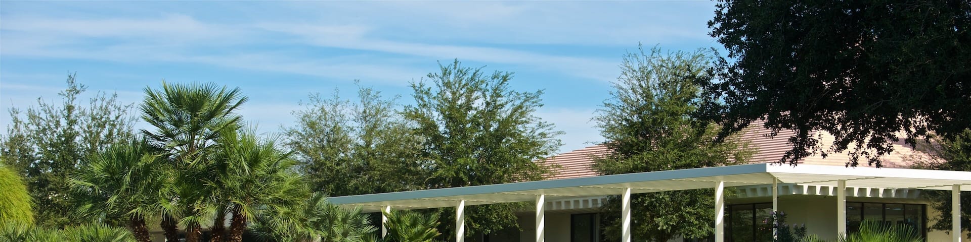Sunnylands Center and Gardens featuring a house, wildflowers and a river or creek