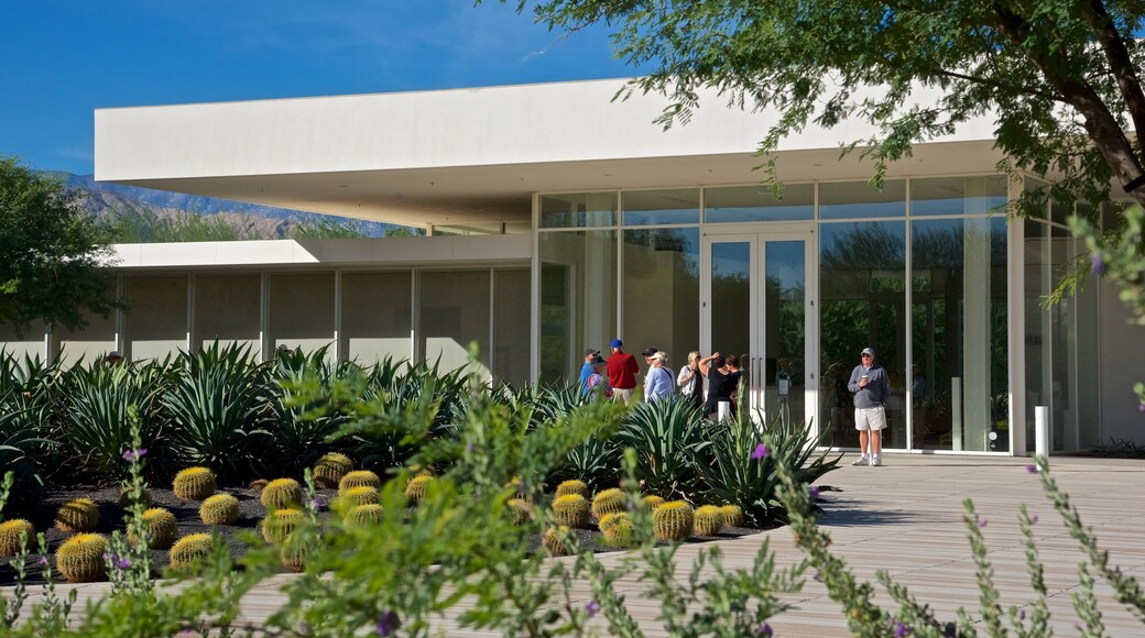 Sunnylands Center and Gardens featuring a garden as well as a small group of people