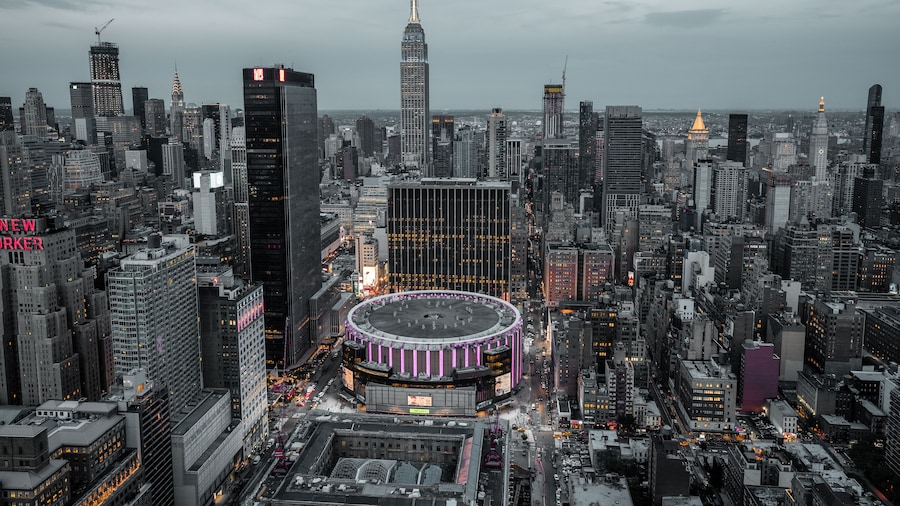 view from top on Madison Square Garden and Empire State Building. Night Lights