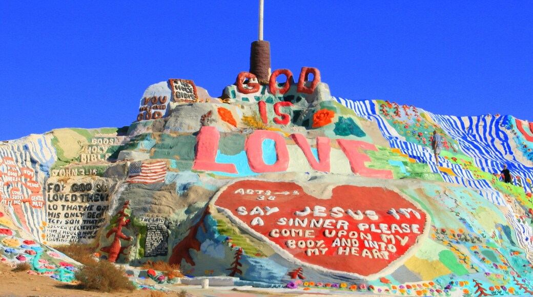 Salvation Mountain is a colorful artificial mountain north of Calipatria, California, near Slab City. It is made from adobe, straw, and thousands of gallons of paint.; Shutterstock ID 82139752