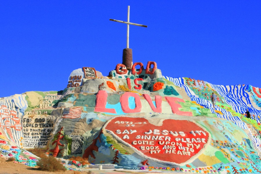 Salvation Mountain is a colorful artificial mountain north of Calipatria, California, near Slab City. It is made from adobe, straw, and thousands of gallons of paint.; Shutterstock ID 82139752