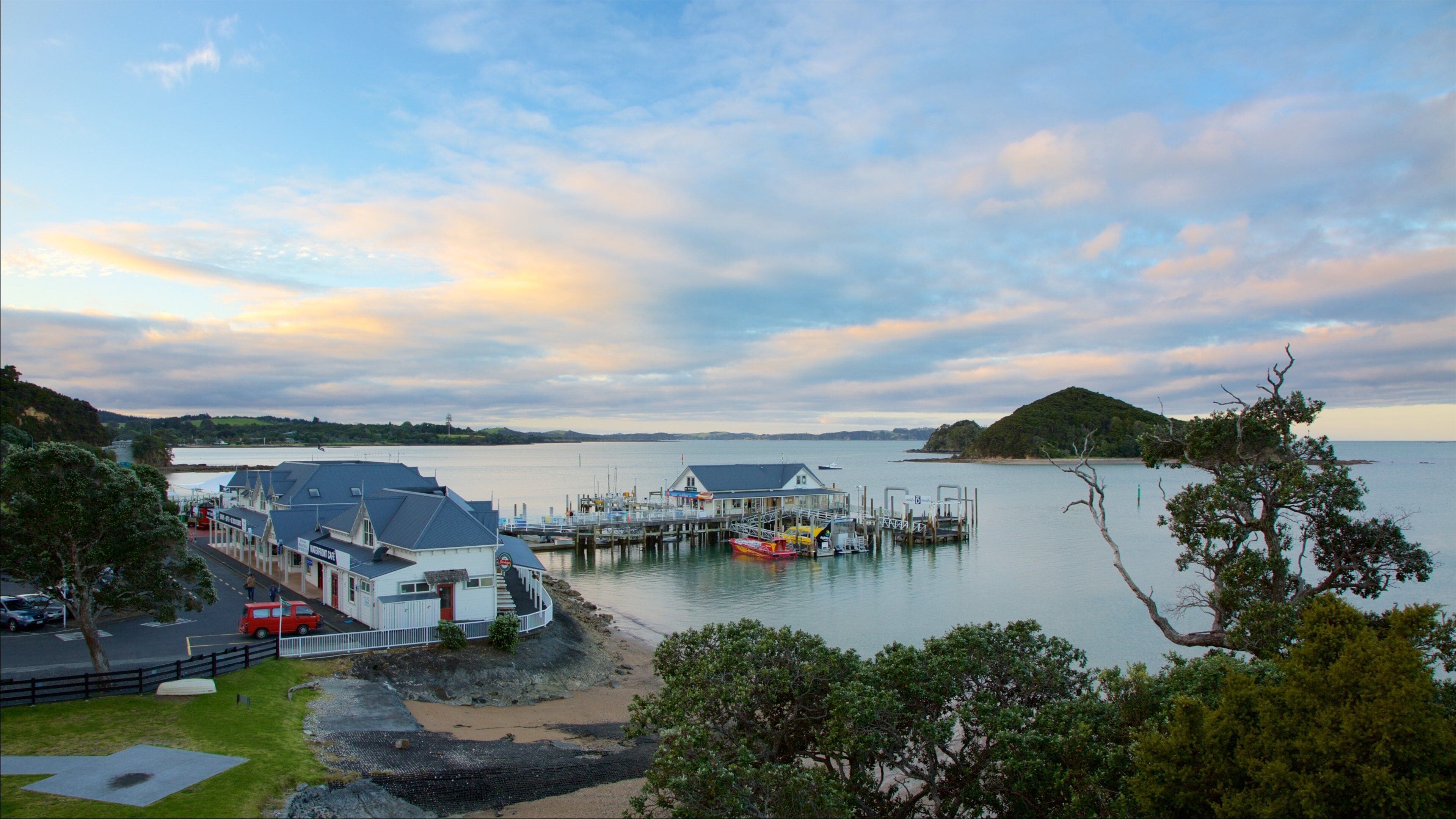 Paihia Wharf featuring island views and a bay or harbour
