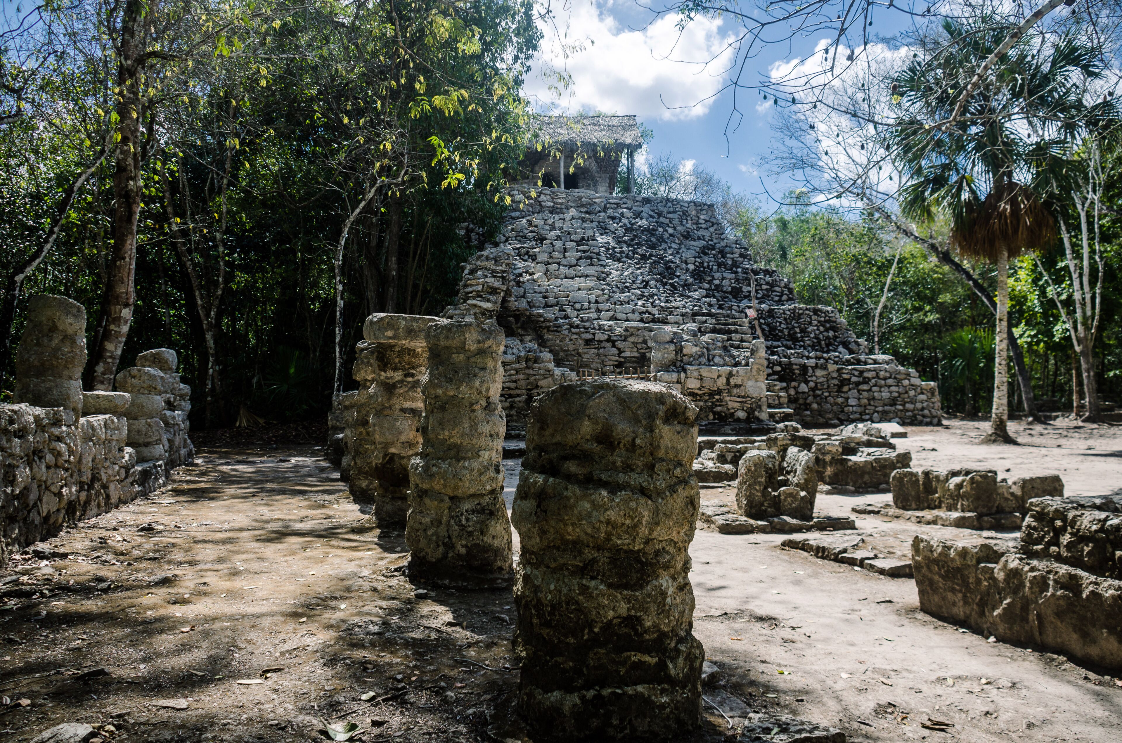 Painting group at archaeological site of Coba, Mexico