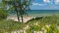 Sandbanks Provincial Park which includes a beach and general coastal views