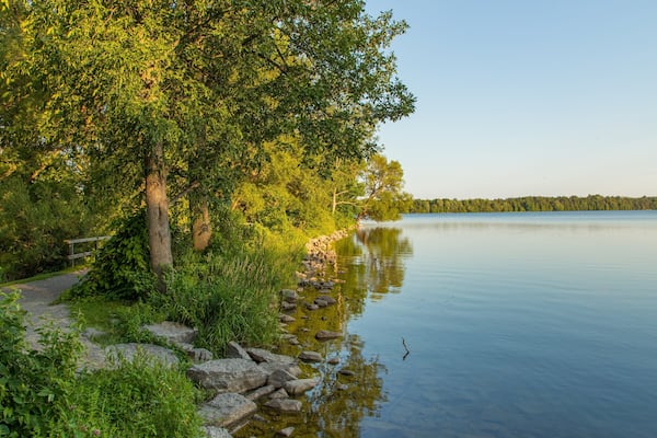 Lake on the Mountain Provincial Park which includes a lake or waterhole and a sunset