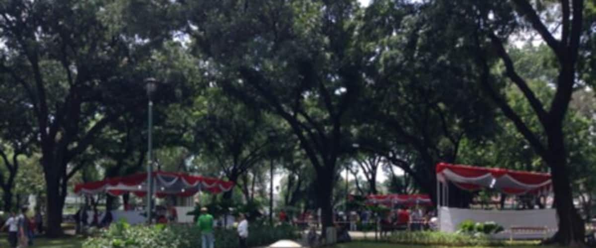 Central of Jakarta on Election Day. The US Ambassador's house and Jakarta Governor's house are right at this park. The tents are normally not around, only for the election. Most dwellers in this up-scale neighborhood don't normally meet or even see their neighbors. But, on Election Day it is the only time when they meet each other. 
The legislative election went smoothly. The organizers at this spot provided free water, juice, ice tea, ice coffee and local chicken porridge. Quite a surprise to see how organized they are. It's once every five years to see this spectacle.