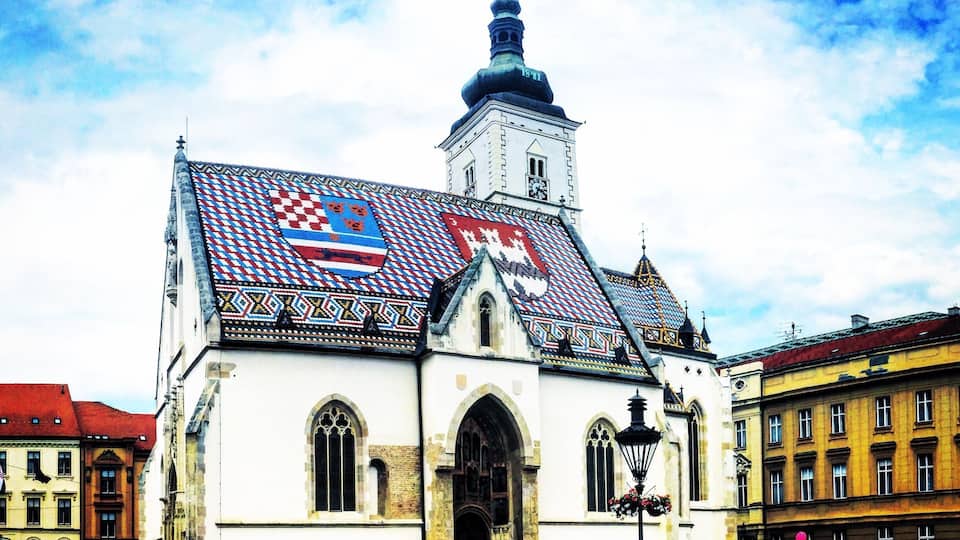 Zagreb, the capital of Croatia, is a city of beautiful architecture and strange and quirky museums. There was a wedding party having their photographs taken with this church when I walked past and I took this picture in between their shots.