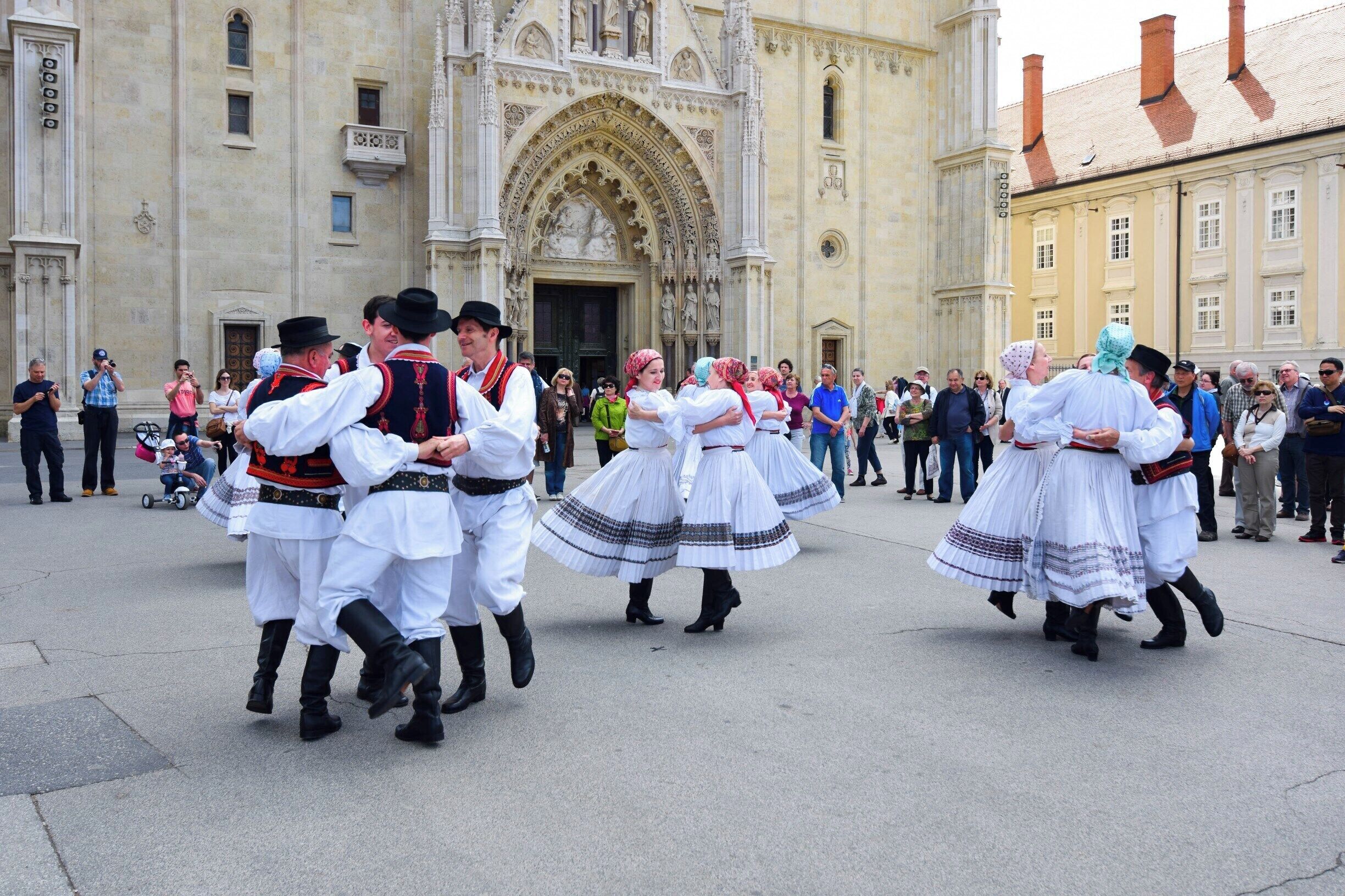 A performance by local artists in the cathedral square on a Sunday morning.