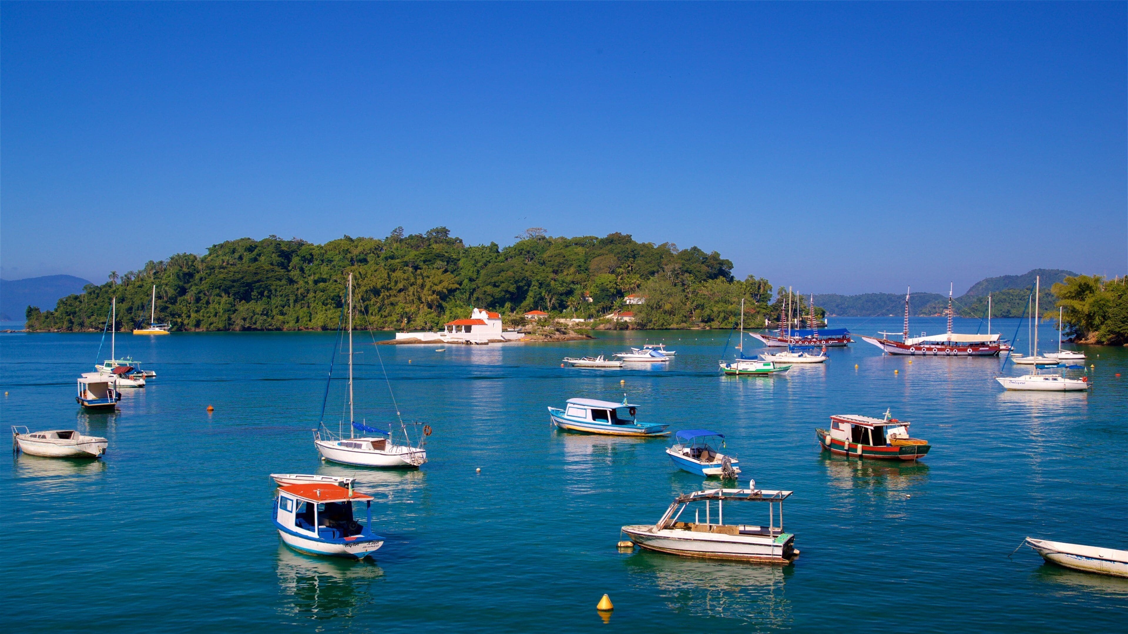 Bonfim Beach featuring a bay or harbor and island images