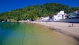 Bonfim Beach which includes a beach, general coastal views and a coastal town