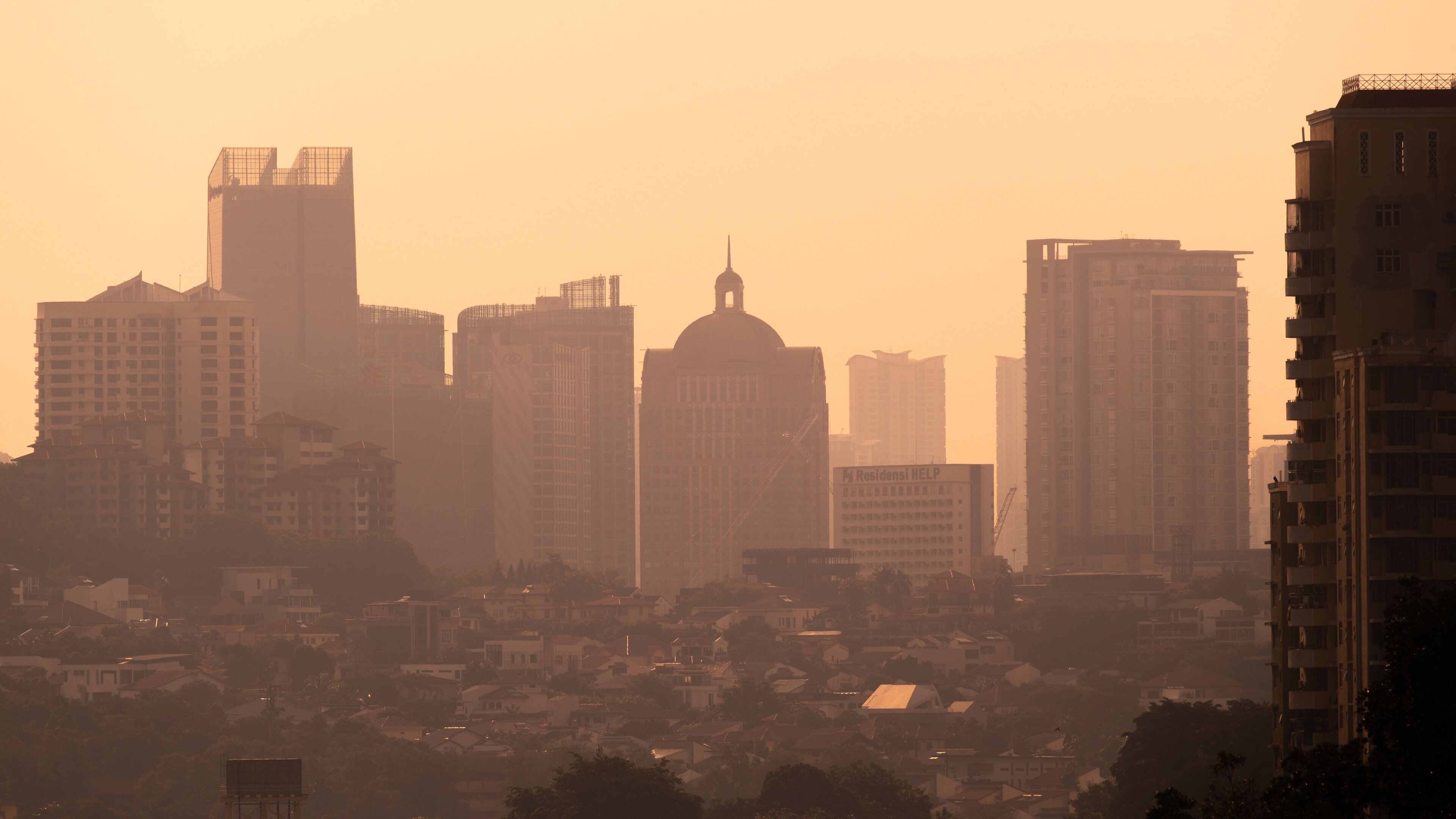 Thean Hou Temple which includes a city, landscape views and a sunset