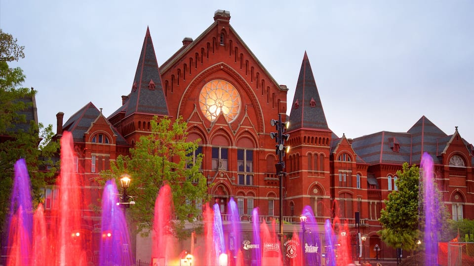 Over-the-Rhine which includes heritage architecture and a fountain