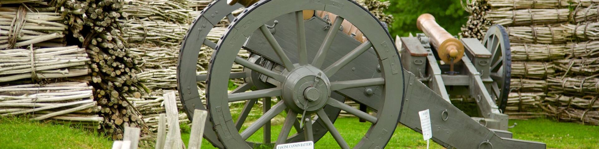 Fort Ligonier showing farmland and a monument