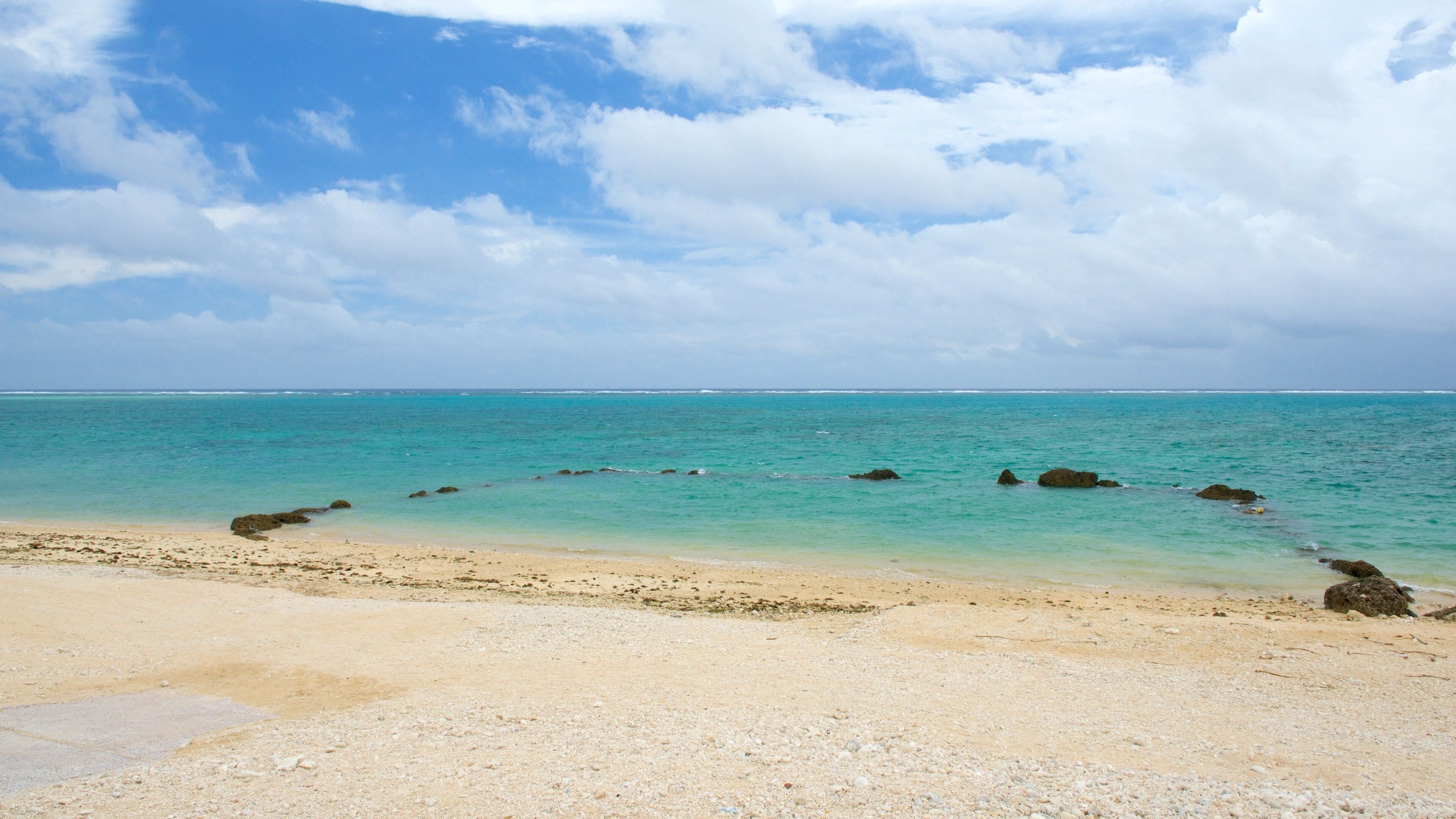 Shiraho Beach which includes a sandy beach