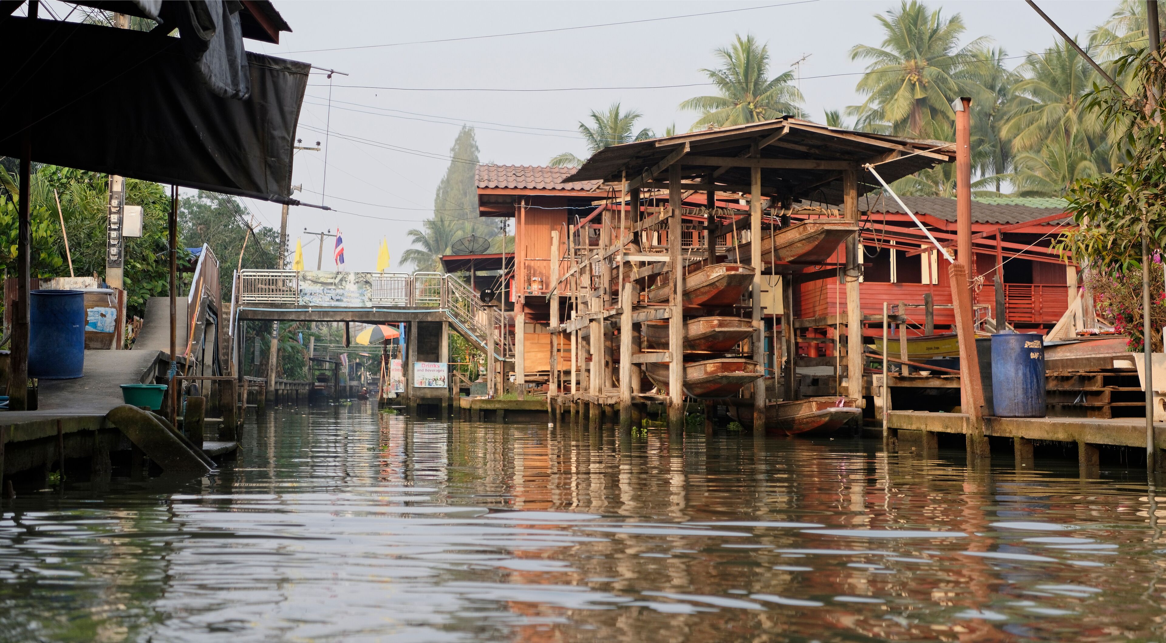 Damnoen Saduak Floating Market.Boat storage between houses on the water