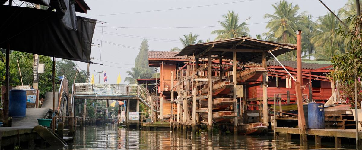Damnoen Saduak Floating Market.Boat storage between houses on the water