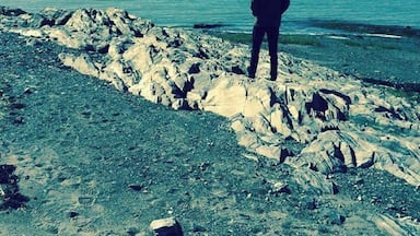 Facing the peaceful St. Lawrence river.