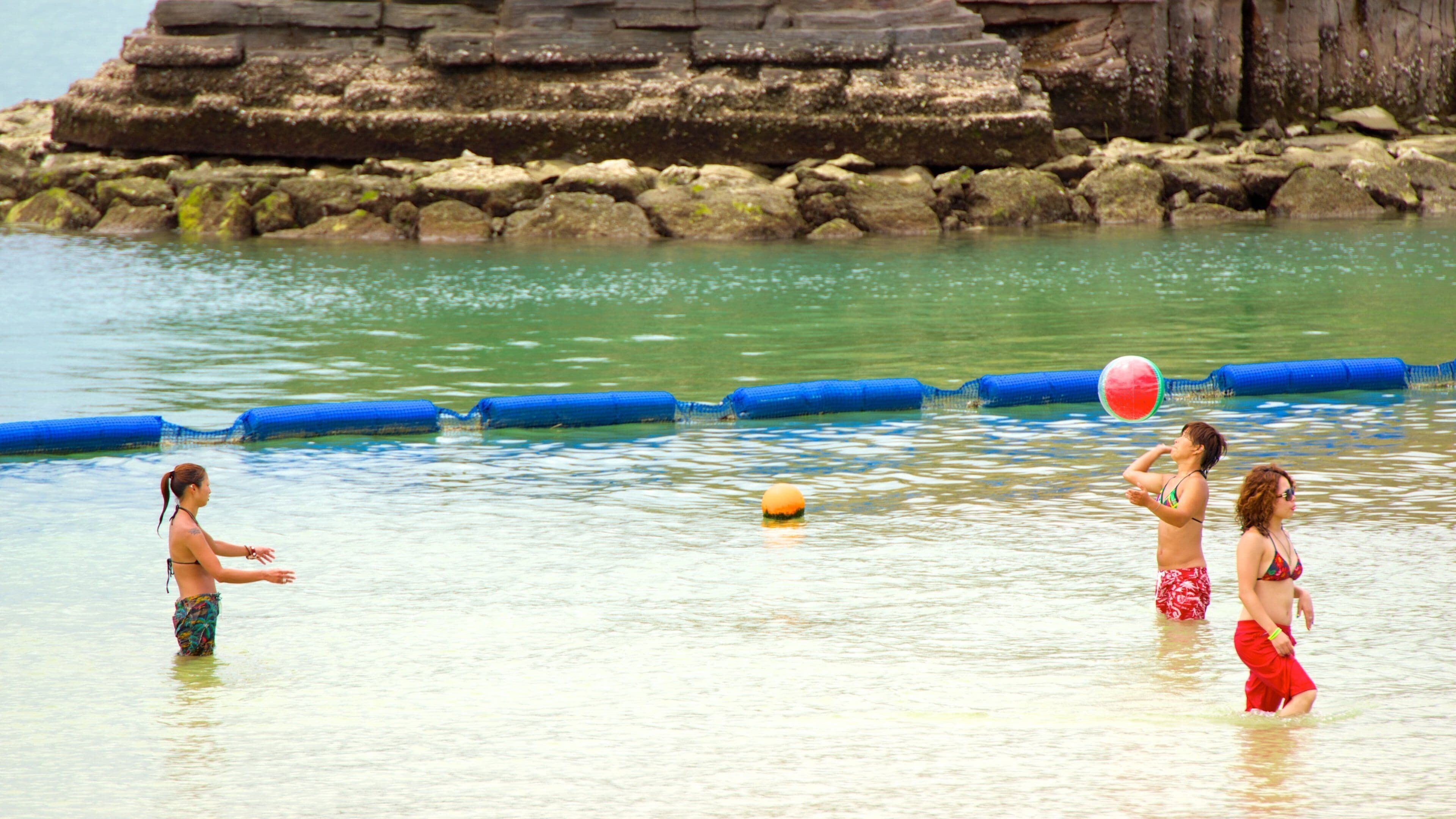 Araha Beach as well as a small group of people
