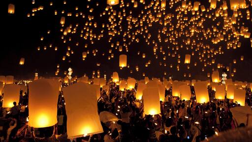 CHIANG MAI, THAILAND -OCT 29: A lot of people are launching sky lanterns in Loy Krathong and Yi Peng Festival. October 29, 2011 at Tu-dong-ka-sa-than,Maejo, Chiang Mai, Thailand