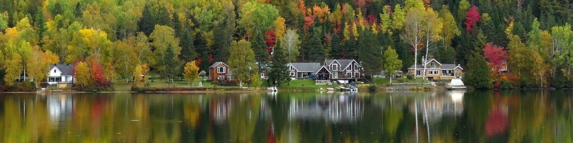 Really cool place to photograph when the autumn colours peak in October. Lac Sainte-Marie right next to the village is surrounded by cliffs on its northern side and houses dot its shore making the whole scenery positively appealling at this time of the year.