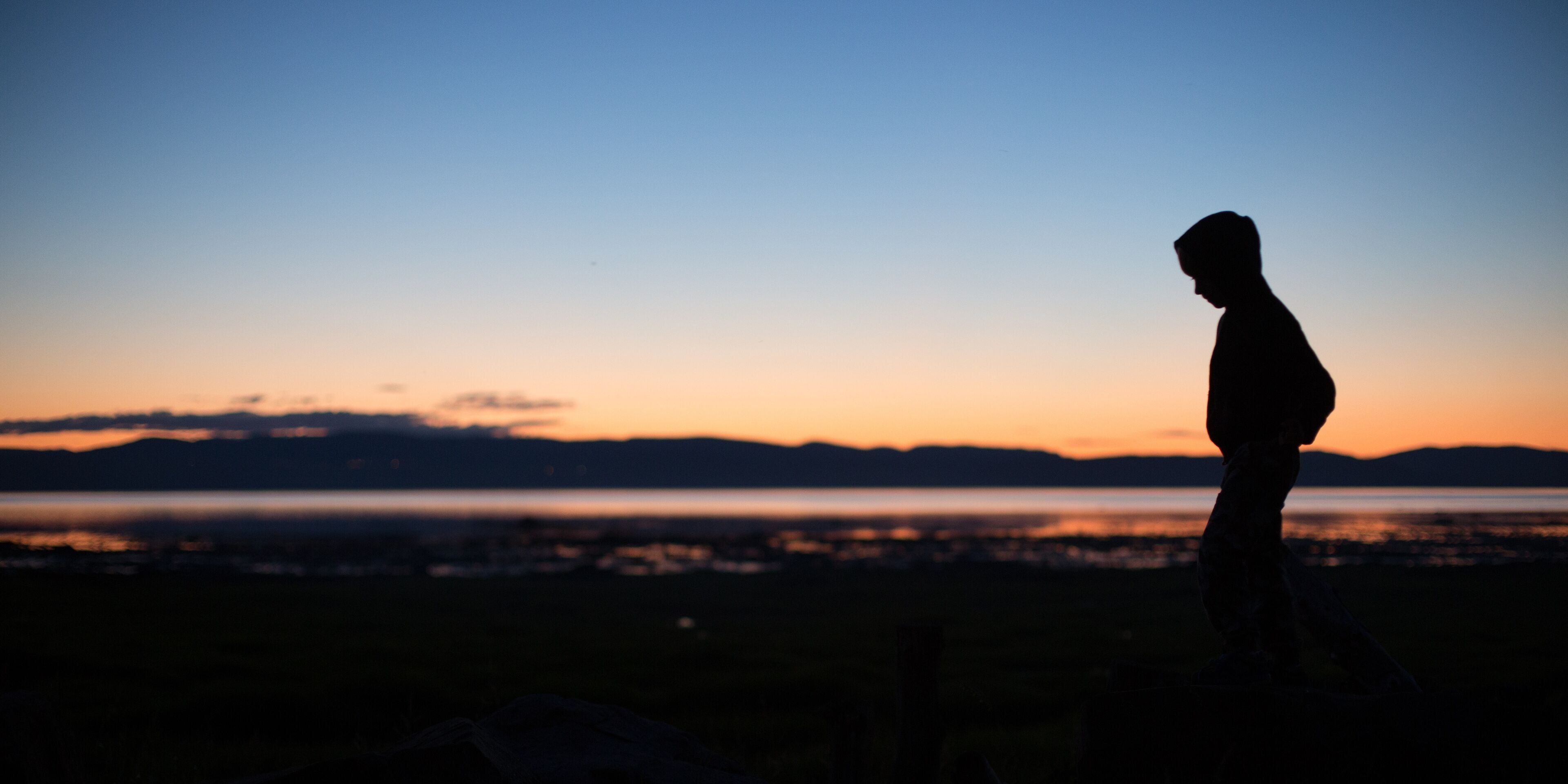 The boy in the sunset