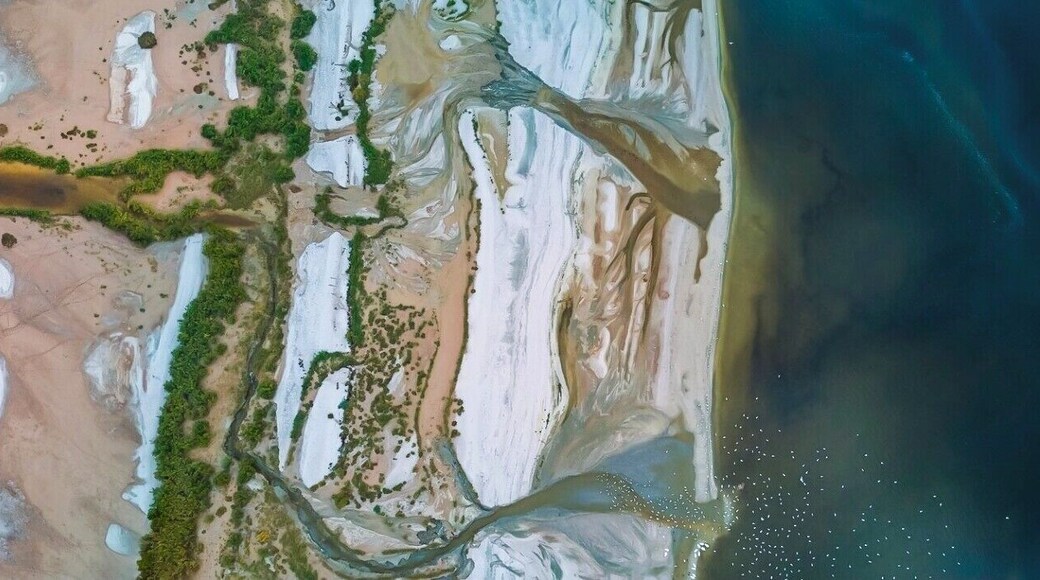 Along the eastern side of the Salton Sea the water flows into the sea and creates all kinds of beautiful colors & patterns. For a bit of scale notice the myriad of seagulls in the lower right of the image waiting for food...
#drone #aerial