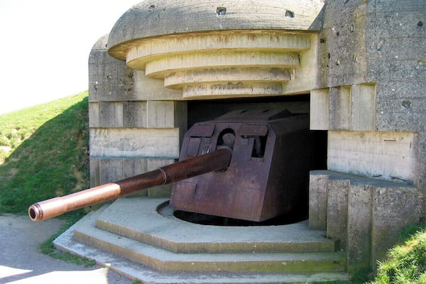 One of four German navy guns positioned at Longues-sur-Mer as part of Hitler's Atlantic Wall. On D-Day these guns fired over 170 rounds at British and American warships, though by nightfall the warships had taken out three them. The next day the entire crew - some 184 men - surrendered to advancing Allied forces.