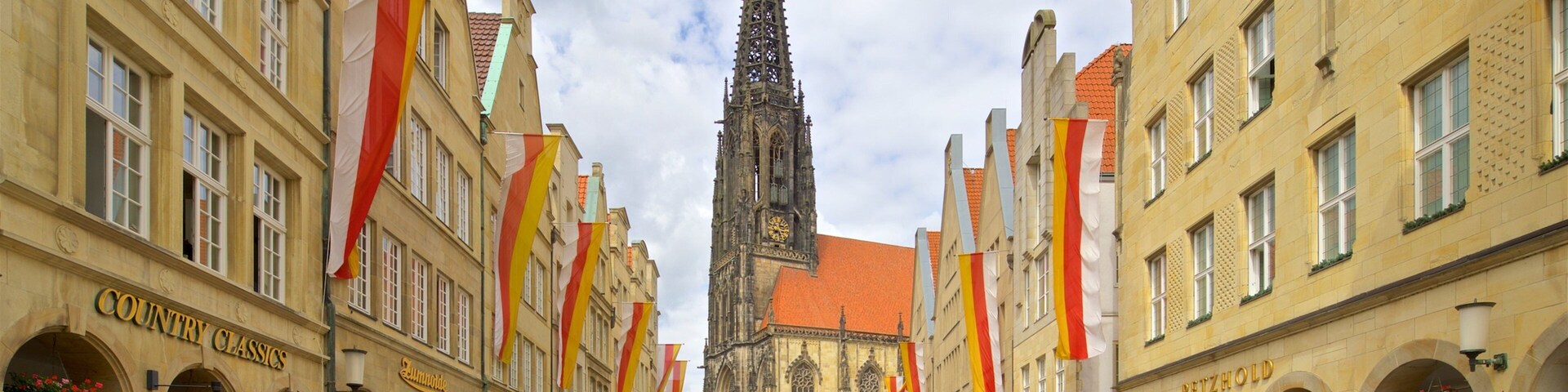 St. Lambert\'s Church which includes street scenes, a city and heritage architecture