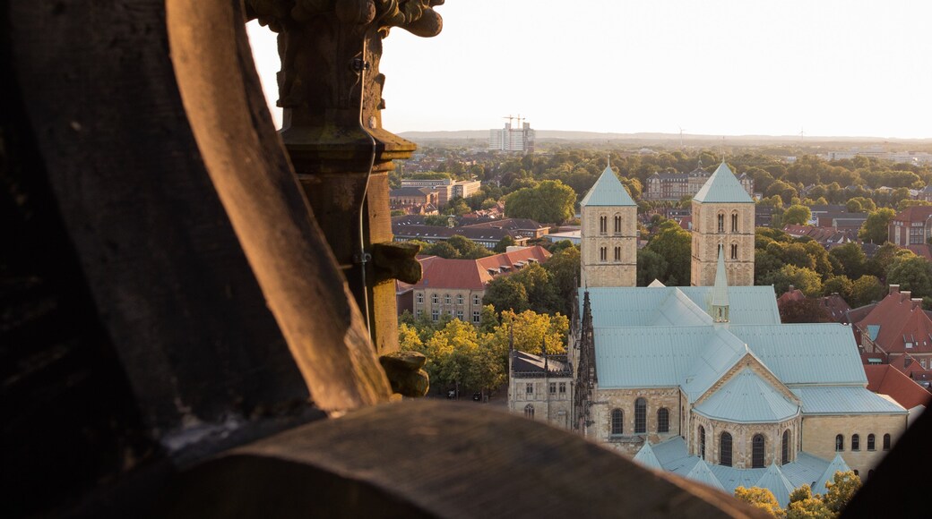 St. Lambert\'s Church which includes a city, a sunset and landscape views
