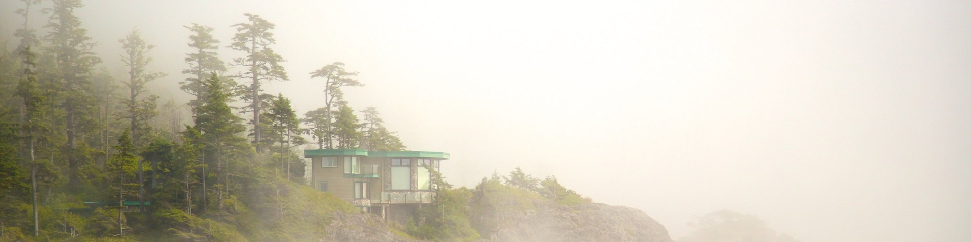 Mackenzie Beach showing mist or fog, a sandy beach and surfing